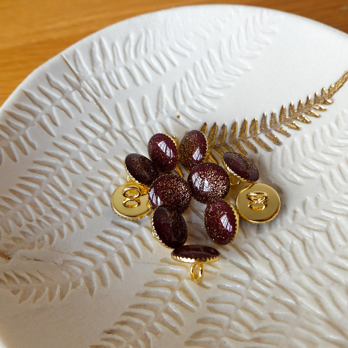 Bouton de bottine pailletté or - Lie de Vin