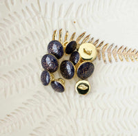 Bouton de bottine pailletté or - Encre