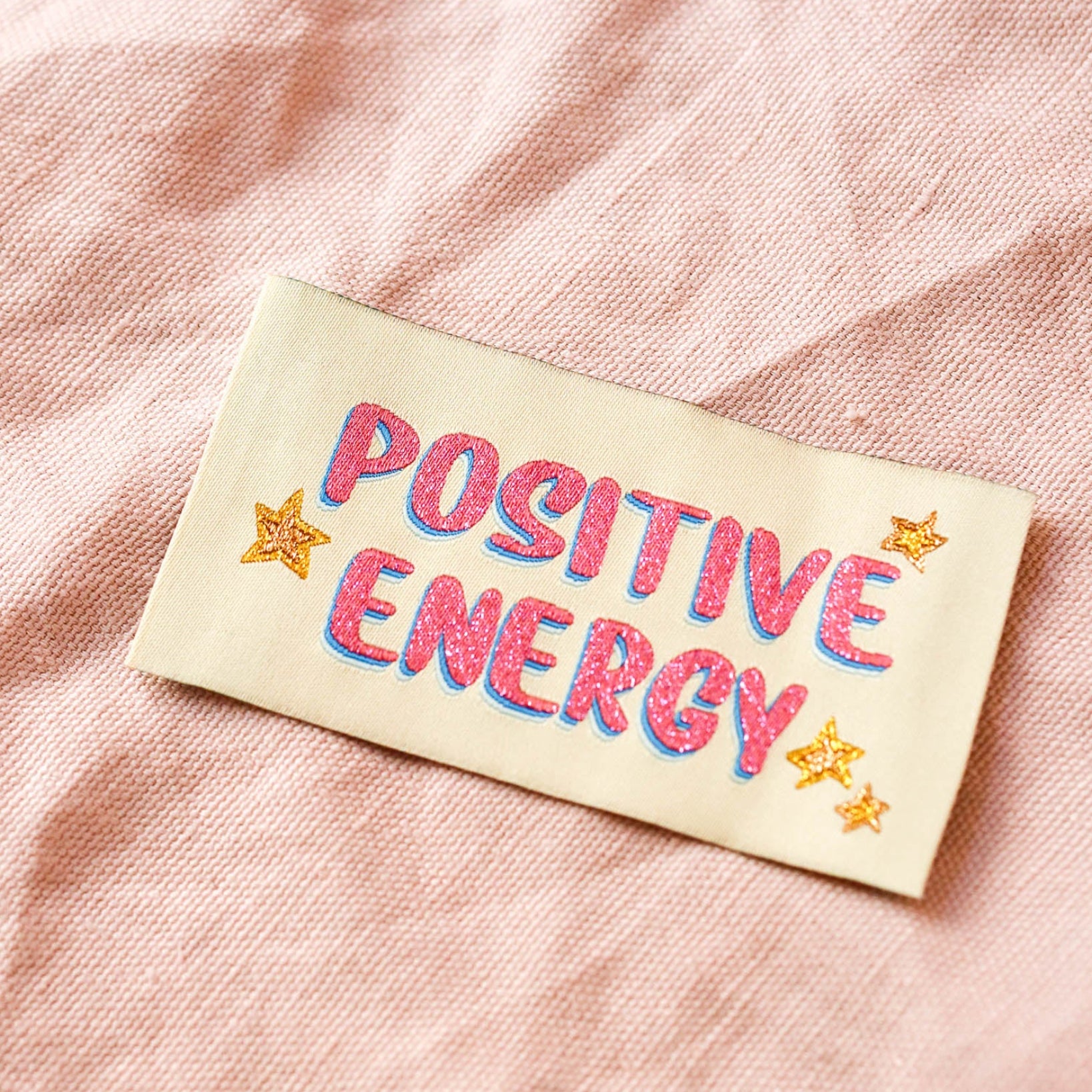 Étiquette Tissée à Coudre “Positive Energy” (à l'unité)