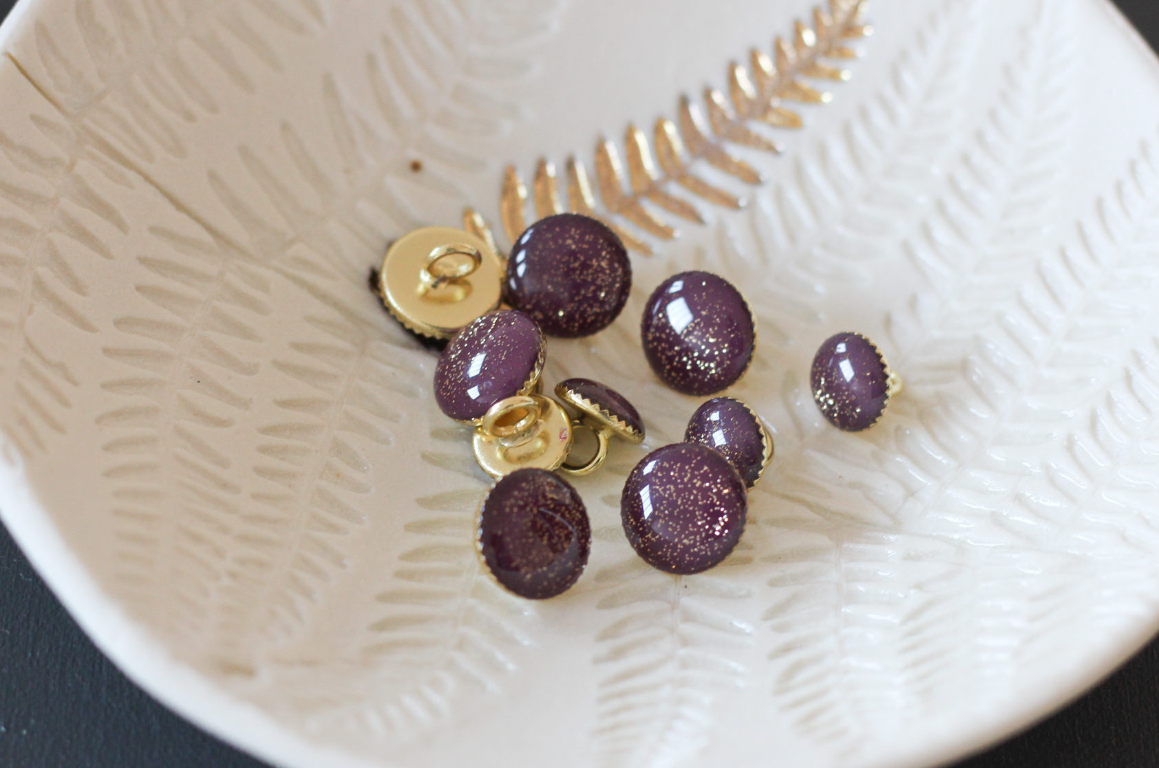 Bouton de bottine pailletté or- Violet