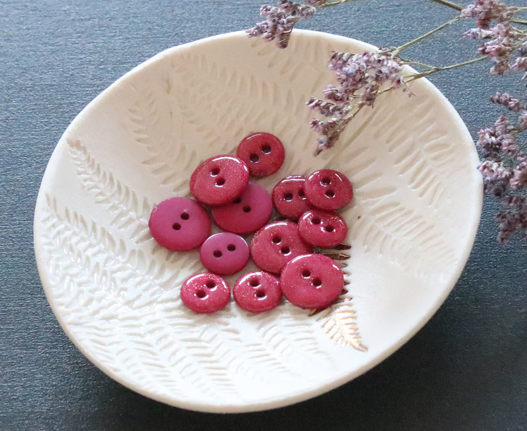 Bouton glitter deux trous - Fuchsia