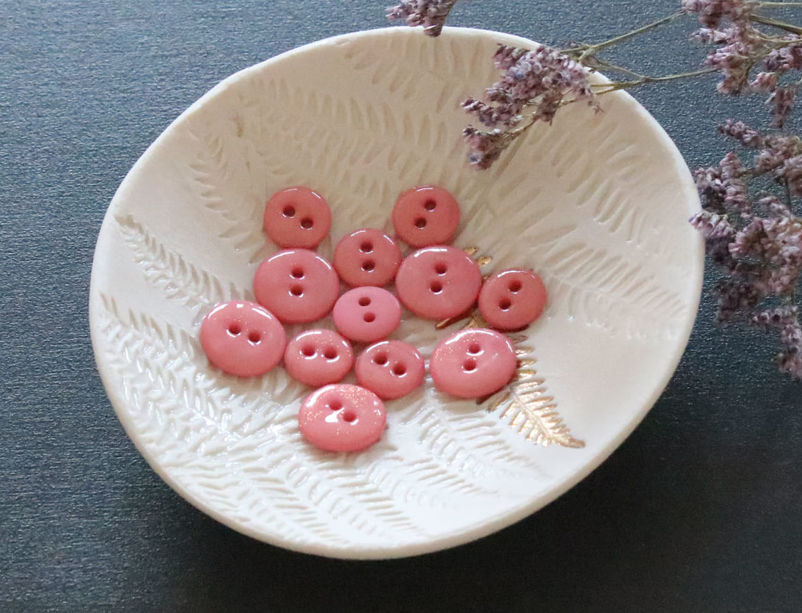 Bouton glitter deux trous - Corail