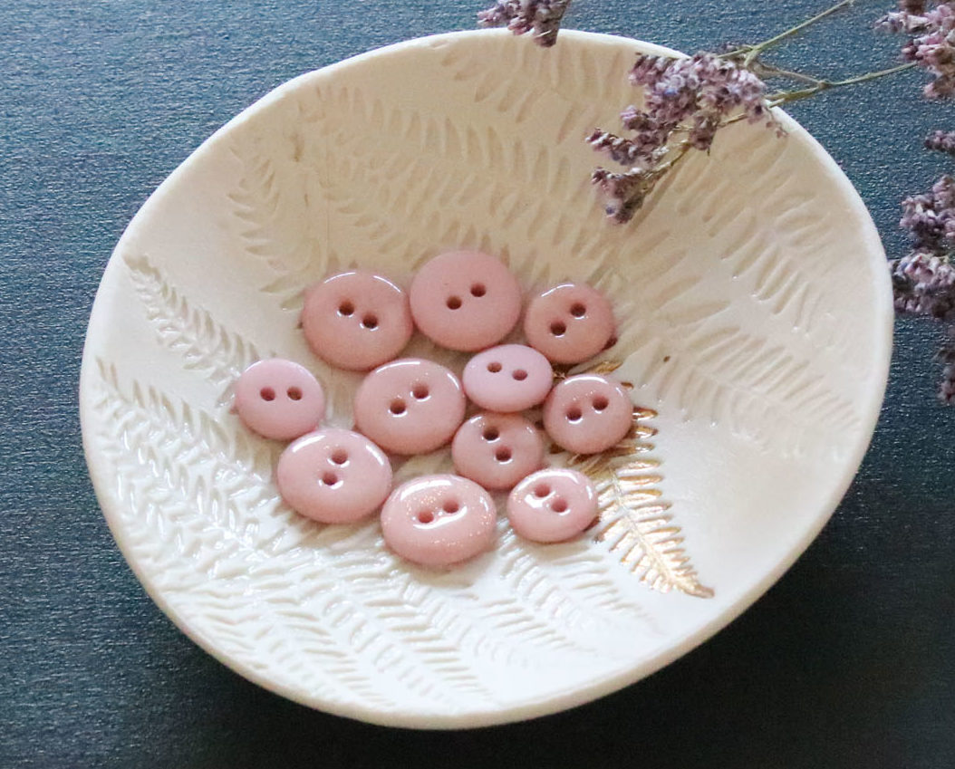 Bouton glitter deux trous - Rose Pâle