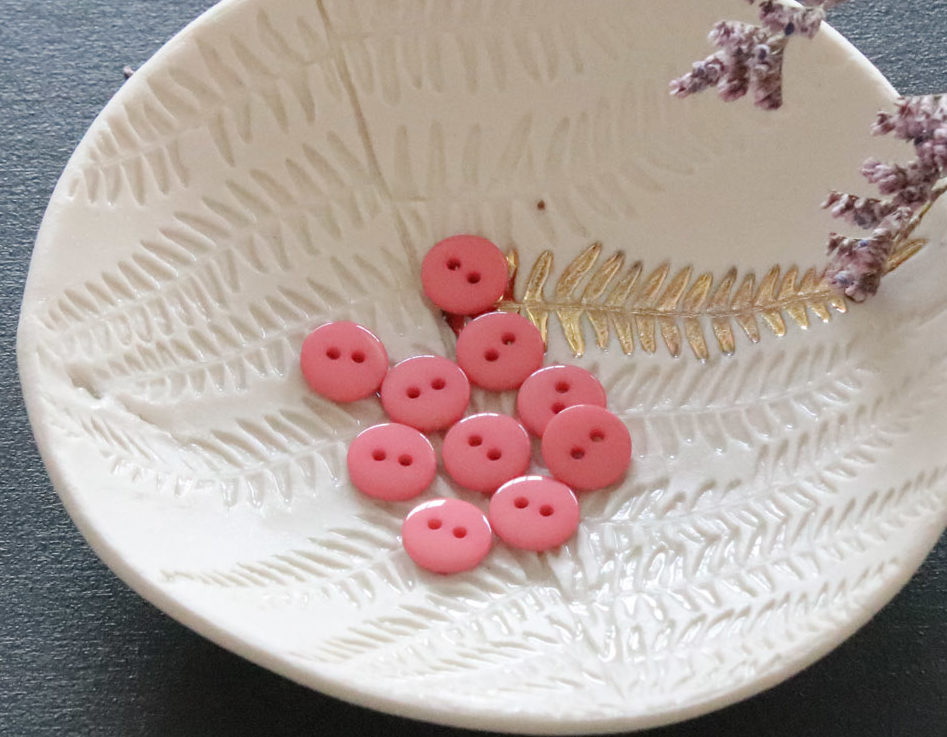 Bouton plat brillant - Corail