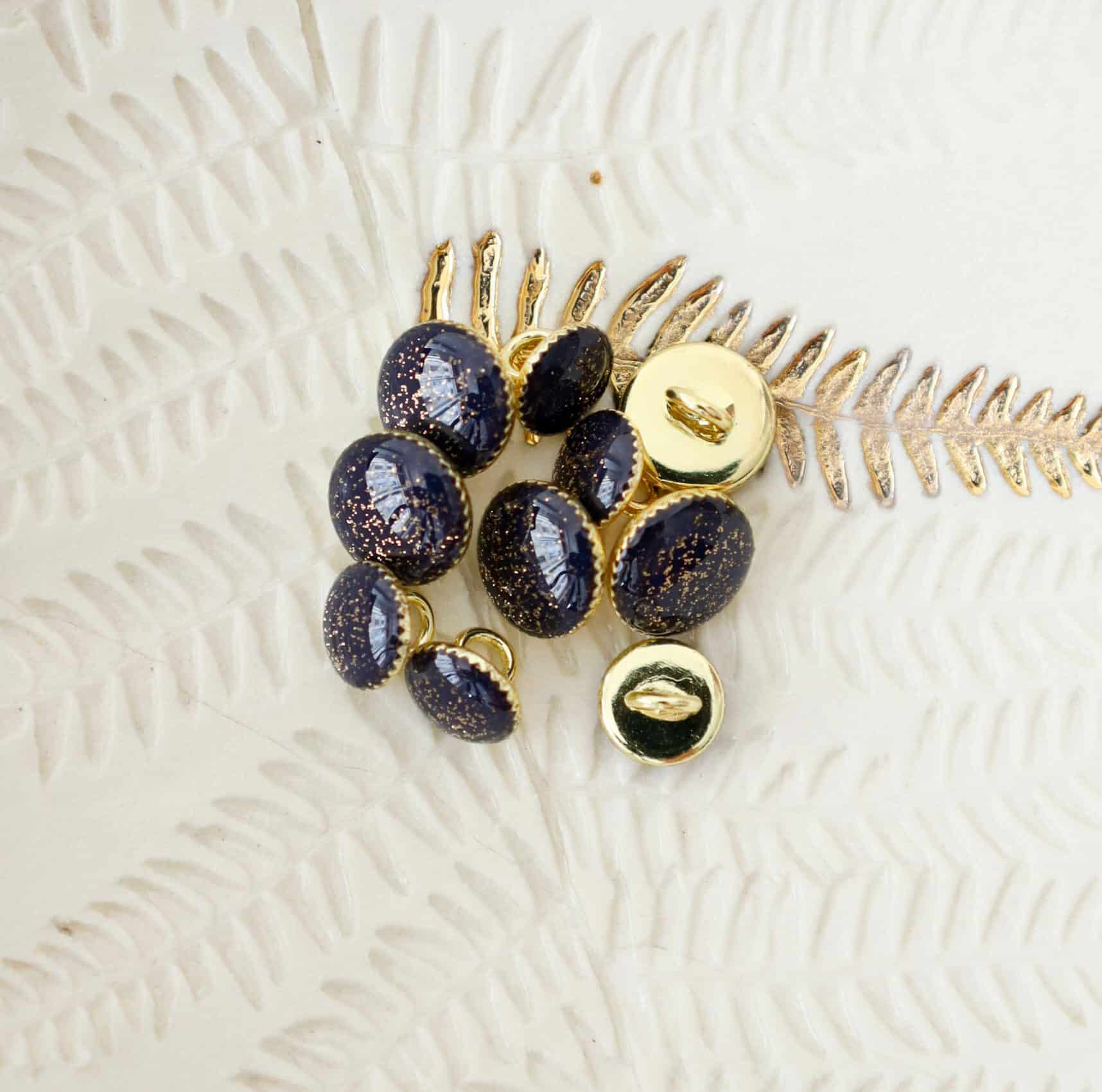 Bouton de bottine pailletté or - Encre