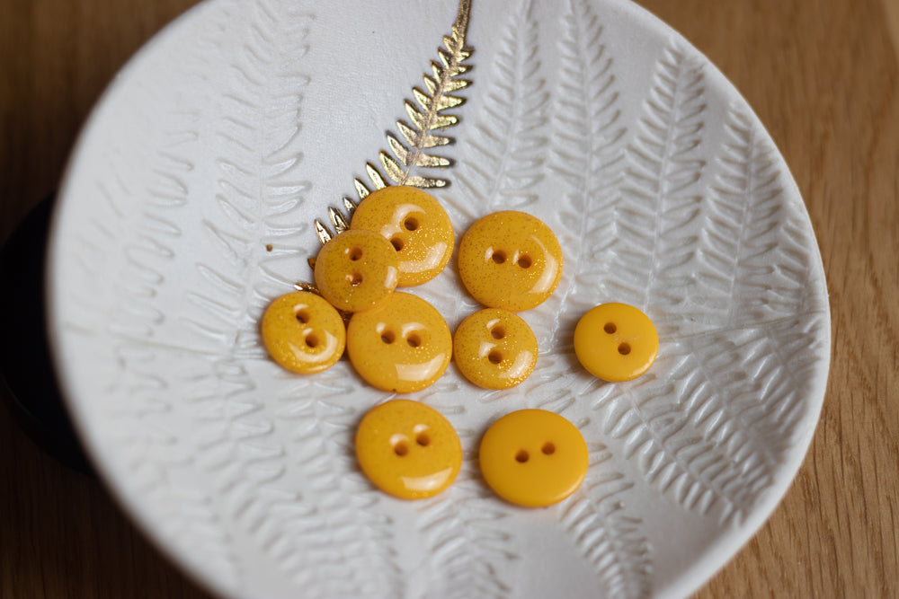 Bouton glitter deux trous - Jaune
